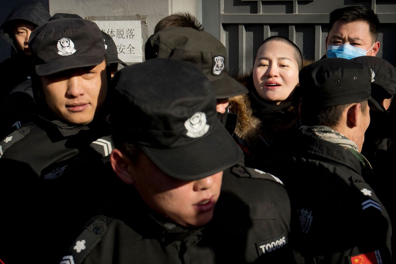Wife of Chinese human rights lawyer protests his treatment