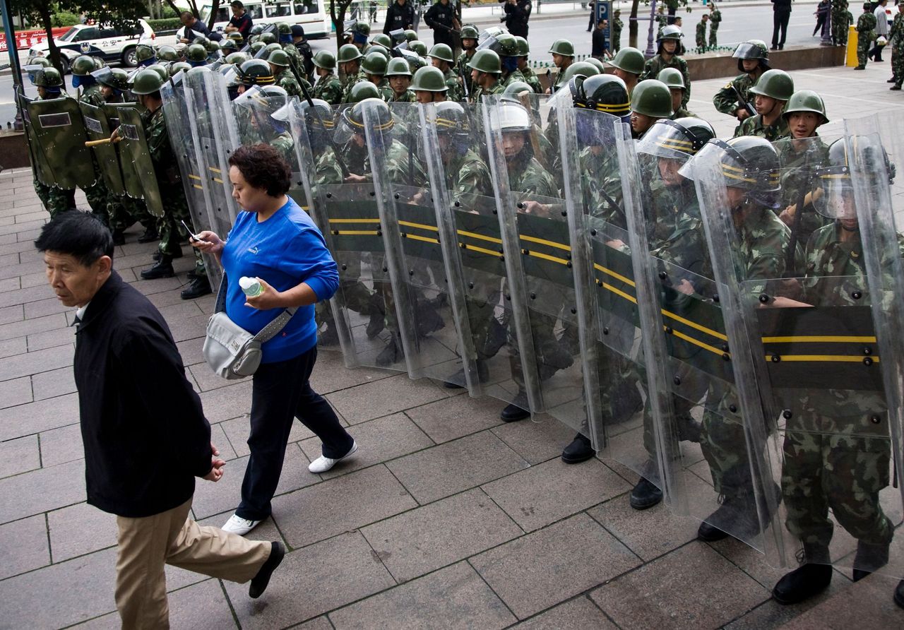 China says it won't rule out using force to reunify Taiwan