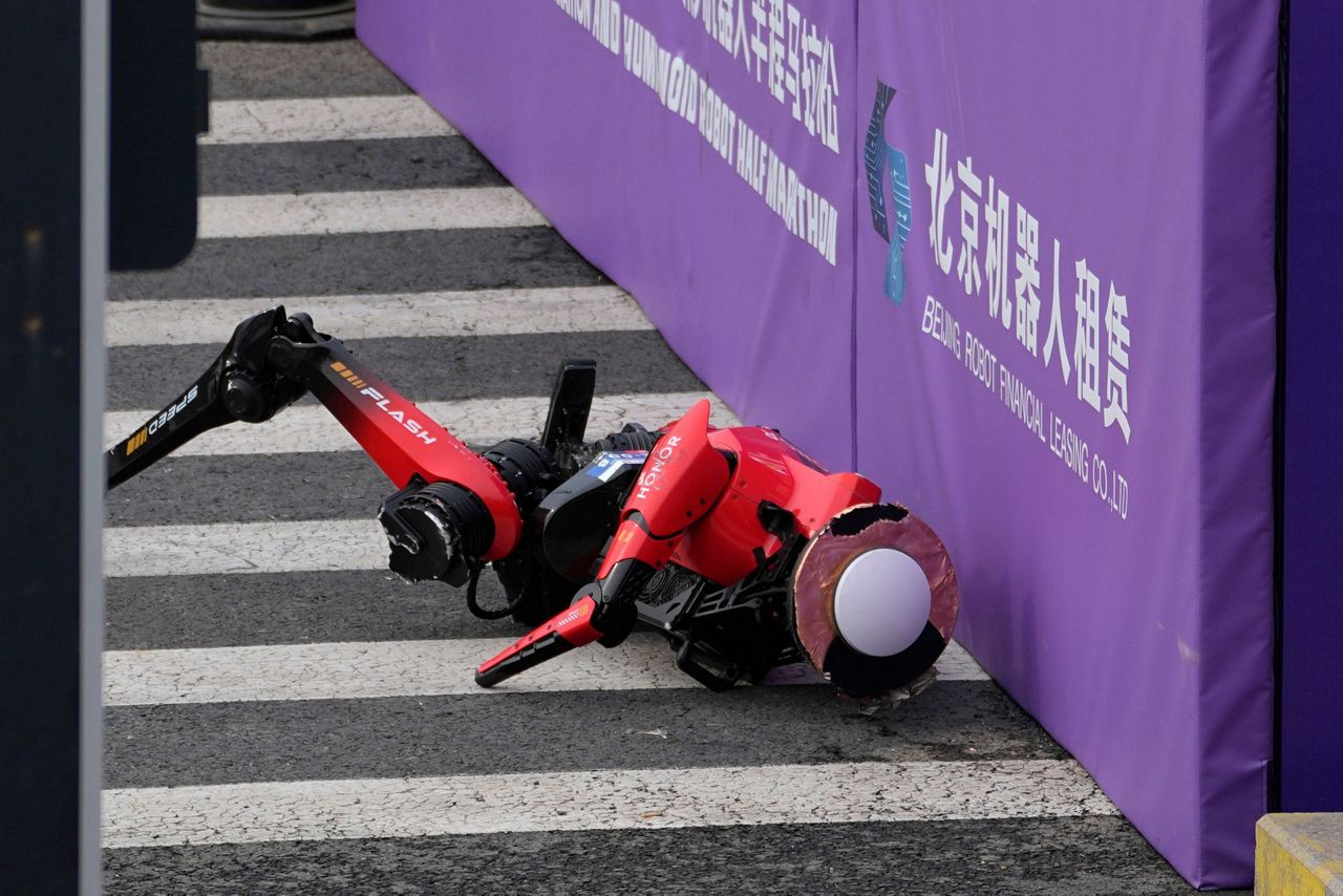 A humanoid robot sprints to victory in Beijing, beating the human half ...