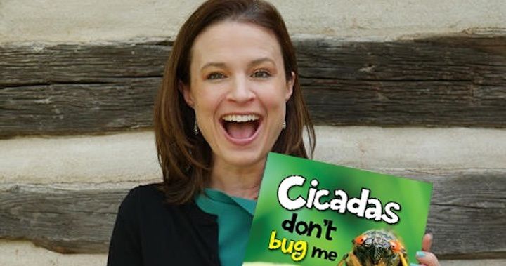 Author Christen Jeschke smiles as she holds her children's book "Cicadas Don't Bug Me." (Photo courtesy of Christen Jeschke)