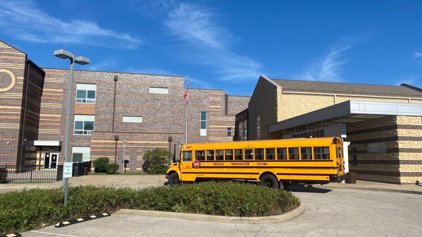 A school bus at a school.