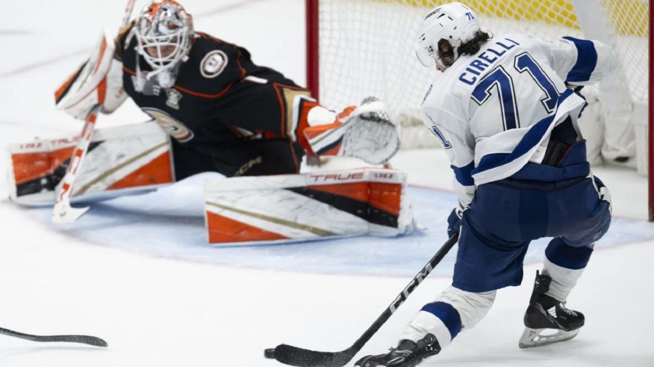 Tampa Bay Lightning center Anthony Cirelli (71) shoots for the game-winning goal during the overtime of an NHL hockey game against the Anaheim Ducks, Sunday, March 24, 2024, in Anaheim, Calif. Lightning won 3-2. (AP Photo/Kyusung Gong)