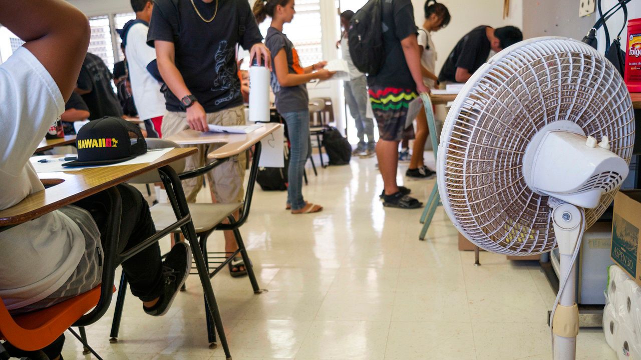 Students appear in a classroom. (AP Photo/Marco Garcia, File)