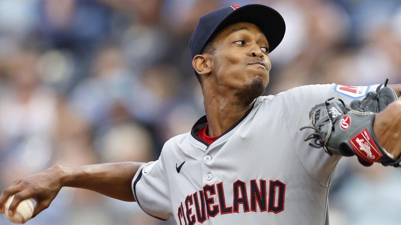 Cleveland Guardians pitcher Triston McKenzie delivers to a Kansas City Royals batter during the first inning of a baseball game in Kansas City, Mo., Friday, June 28, 2024. (AP Photo/Colin E. Braley)