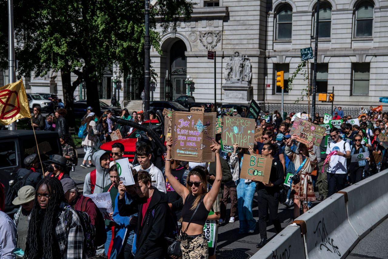 Protesters fear climate change impacts, demand aid for poor