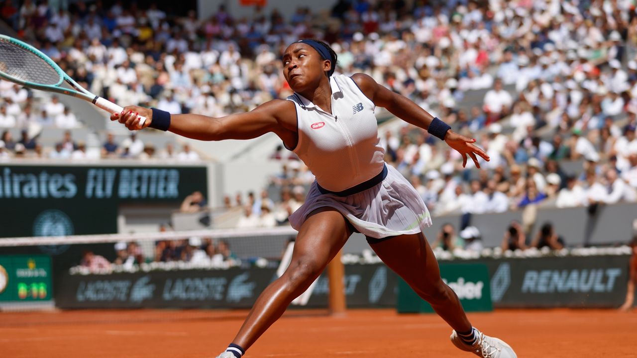 Coco Gauff of the U.S. plays a shot against Poland's Iga Swiatek during their semifinal match of the French Open tennis tournament at the Roland Garros stadium in Paris, Thursday, June 6, 2024. (AP Photo/Jean-Francois Badias, File)