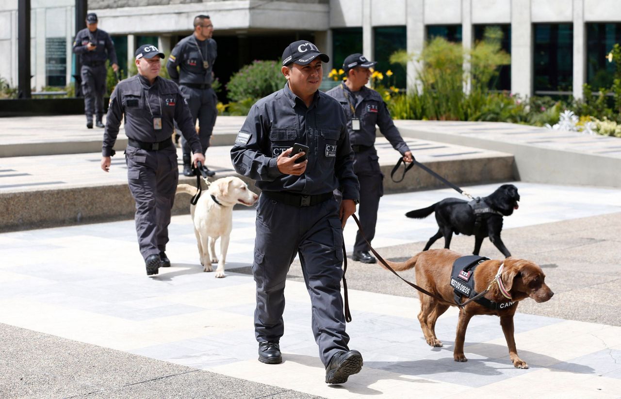 Colombia police retire police dogs in emotional ceremony