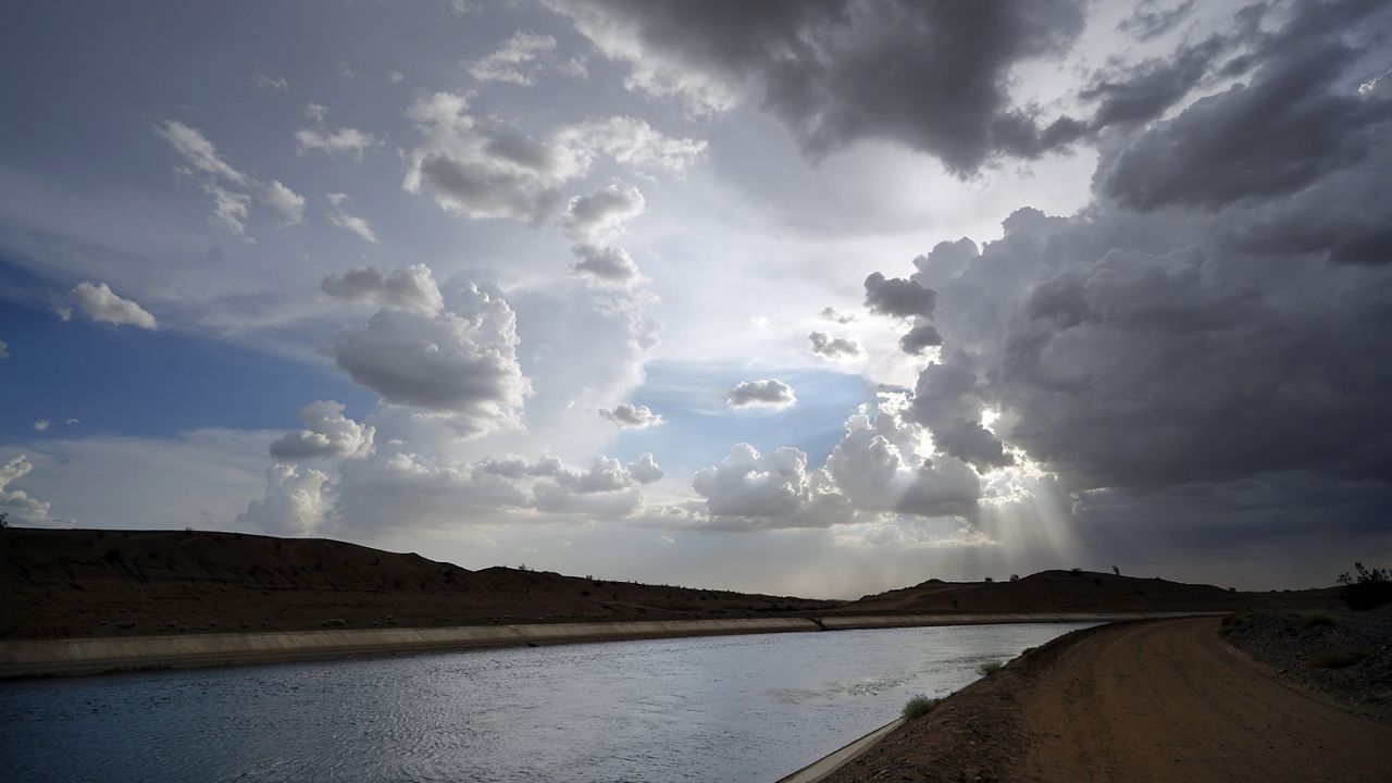 Water flows along the All-American Canal, Aug. 13, 2022, near Winterhaven, Calif. (AP Photo/Gregory Bull)