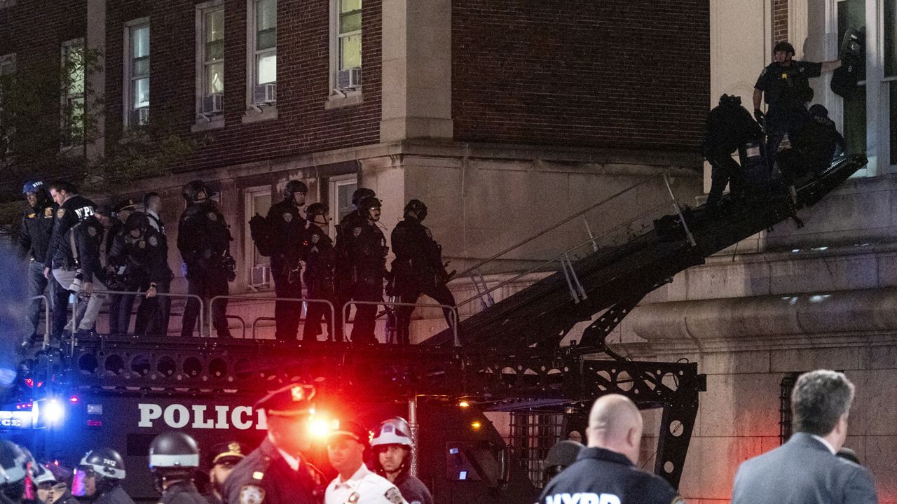 Using a tactical vehicle, New York City police enter an upper floor of Hamilton Hall on the Columbia University campus in New York Tuesday, April 30, 2024, after a building was taken over by protesters earlier Tuesday. (AP Photo/Craig Ruttle) 
