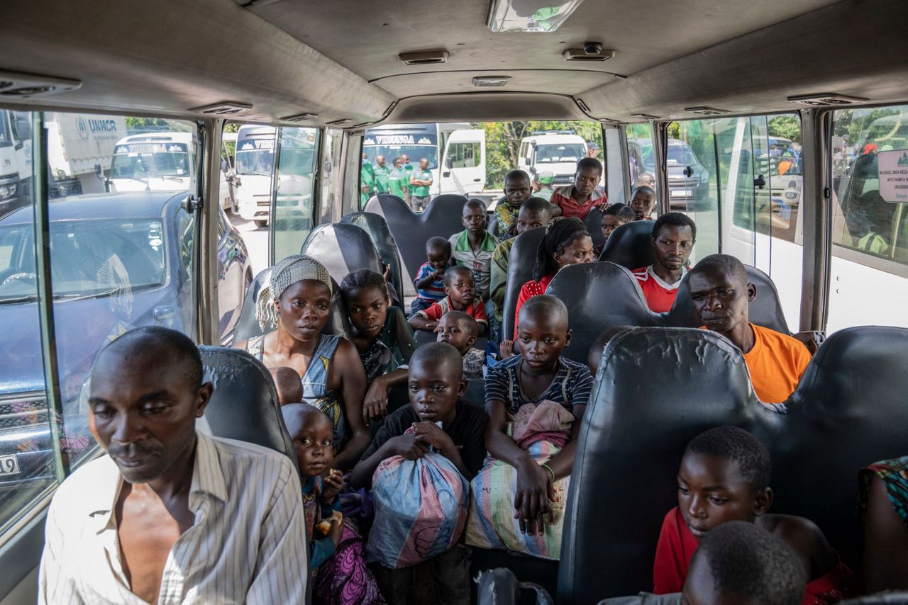 Hundreds of Rwandans who fled to Congo after the 1994 genocide return ...