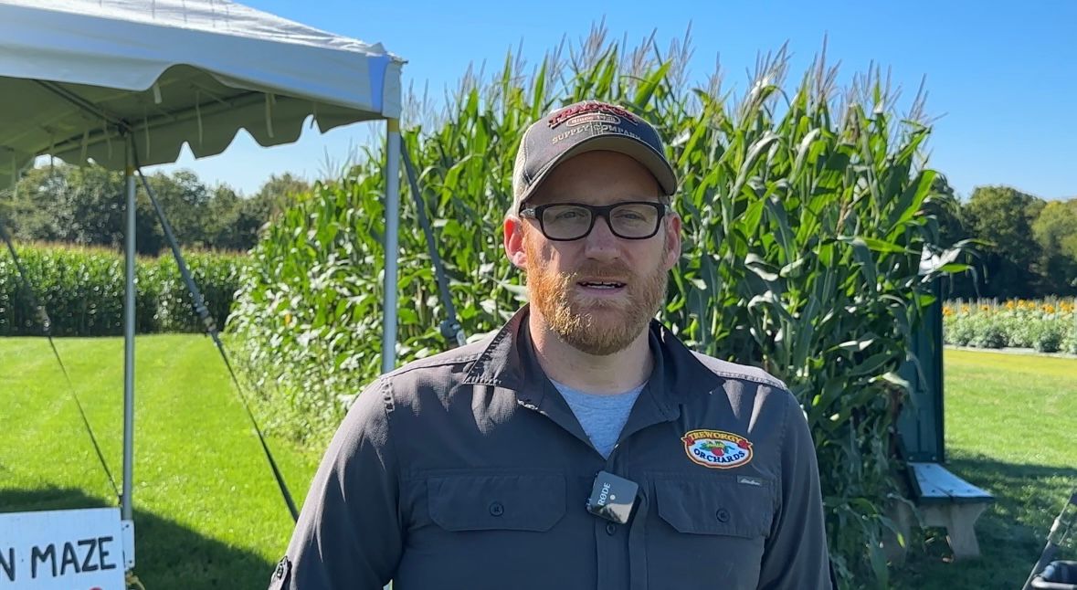 Jonathan Kenerson, co-owner of Treworgy Family Orchards in Levant, talks about the new Peter Rabbit themed corn maze at the farm. (Spectrum News/Susan Cover)