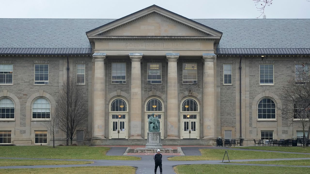 People walk on the campus of Cornell University in Ithaca, N.Y., Friday, Feb. 2, 2024. (AP Photo/Seth Wenig) 