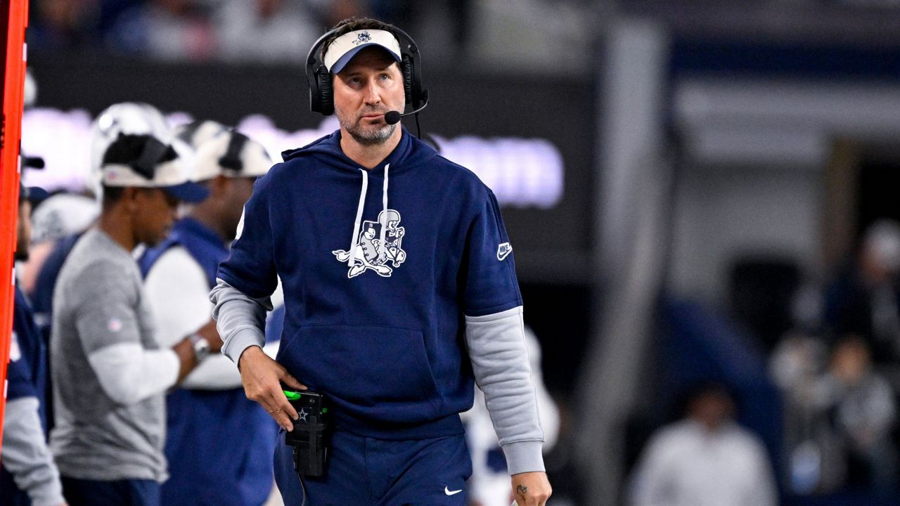 Dallas Cowboys offensive coordinator Brian Schottenheimer looks on from the sidelines during an NFL football game against the New York Giants in Arlington, Texas, Thursday, Nov. 28, 2024. (AP Photo/Jerome Miron, File)