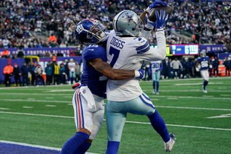 Dallas Cowboys defensive tackle Neville Gallimore (96) celebrates with fans  after an NFL football game against the New York Giants, Sunday, Dec. 19,  2021, in East Rutherford, N.J. The Dallas Cowboys defeated