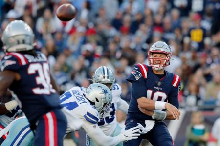 Prescott TD pass lifts Cowboys to 35-29 OT win over Pats