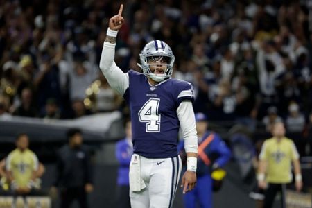 Dallas Cowboys' Michael Gallup, left, and CeeDee Lamb, rightr, celebrate  after Lamb caught a pass for a touchdown during the second half of an NFL  football game against the Green Bay Packers