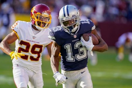 Dallas Cowboys' Michael Gallup (13) celebrates his touchdown catch in the  second half of an NFL