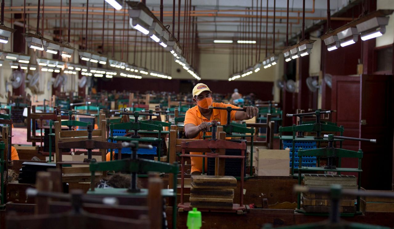 In Cuba, novels and news accompany rolling of cigars