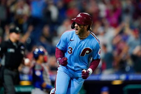 Bryce Harper reacts after scoring the second of the Nationals 4