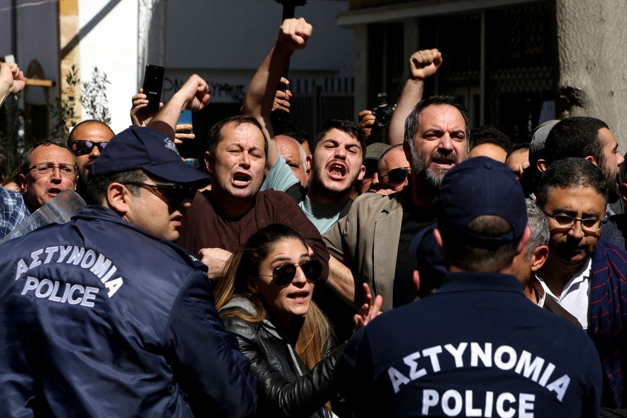 Cyprus police pepper spray protesters at shut crossing point