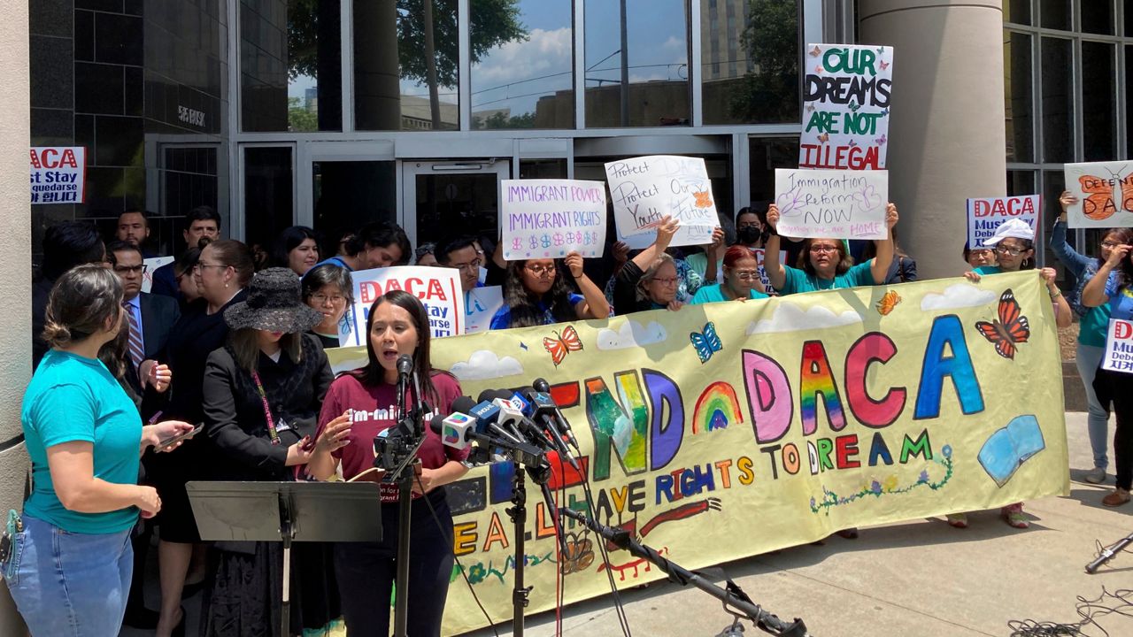 Maritza Gutierrez Ramos, 28, speaks at a rally outside the federal courthouse following a hearing on the fate of a revised version of the Deferred Action for Childhood Arrivals, or DACA, program, Thursday, June 1, 2023 in Houston. A federal judge did not make an immediate decision Thursday on the fate of a revised version of a federal policy that prevents the deportation of hundreds of thousands of immigrants brought to the U.S. as children. (AP Photo/Juan A. Lozano)