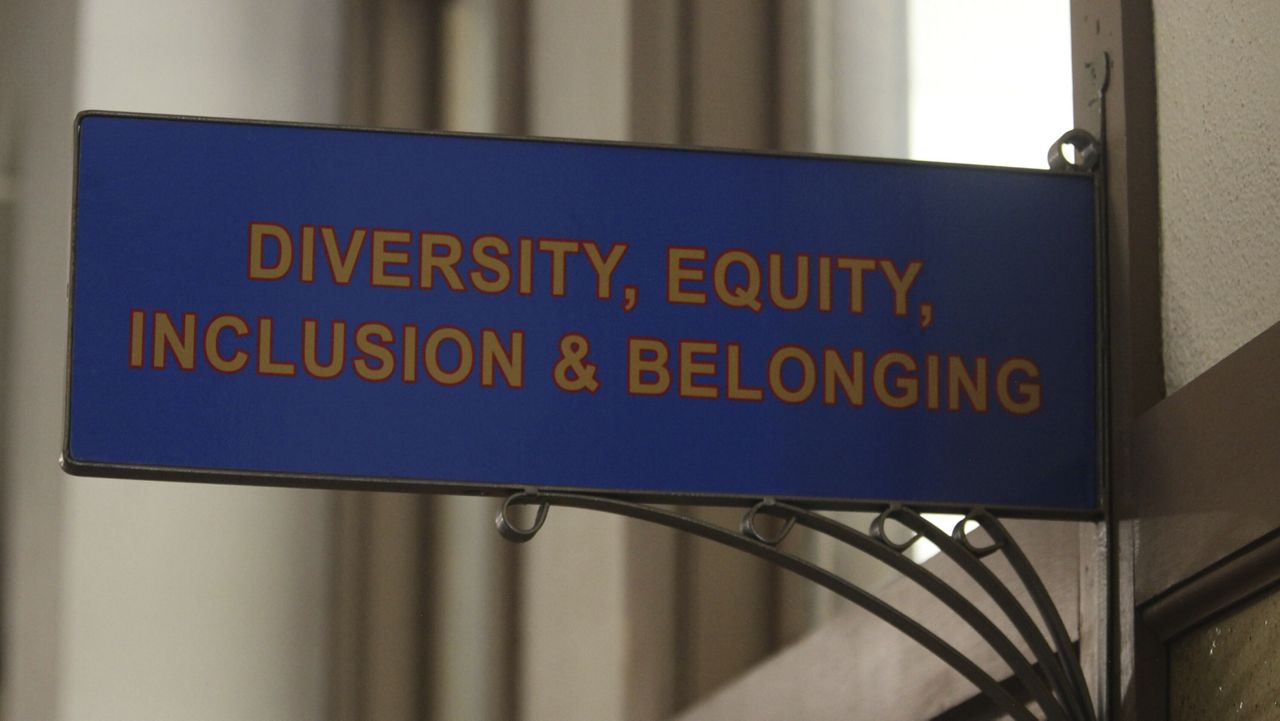 The sign above the door to the Office of Diversity, Equity, Inclusion and Belonging inside the main administration building on the main University of Kansas campus is seen on Friday, April 12, 2024, in Lawrence, Kan. (AP Photo/John Hanna, File)