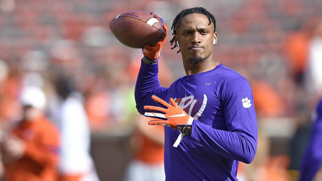FILE - Clemson's Diondre Overton runs drills during warmups before an NCAA college football game against Wake Fores, Nov. 16, 2019, in Clemson, S.C. (AP Photo/Richard Shiro, File)