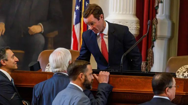 House Speaker Dade Phelan speaks with other representatives during a special legislative session at the state capitol in Austin, Texas, on Nov. 17, 2023. (The Texas Tribune/Julius Shieh)