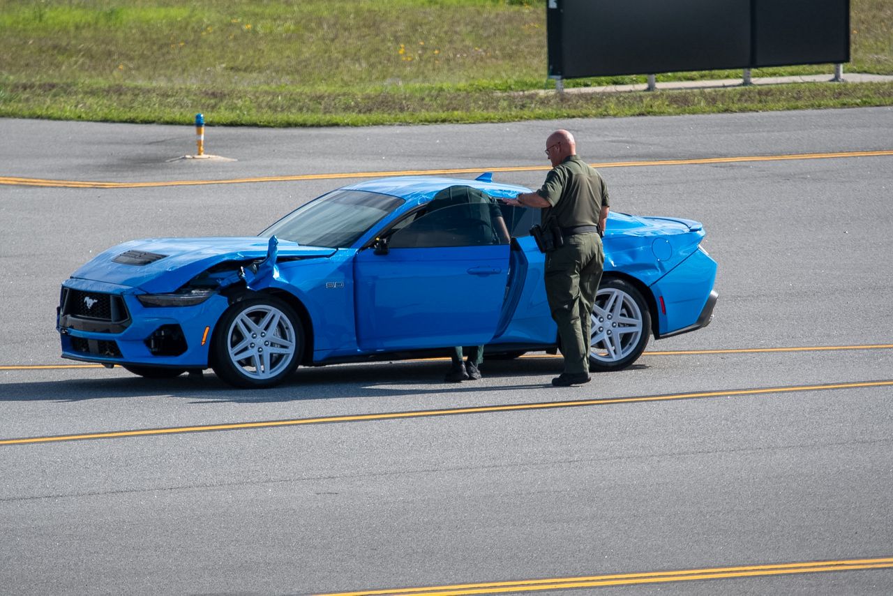 Holly Hill man accused of crashing car through airport gate