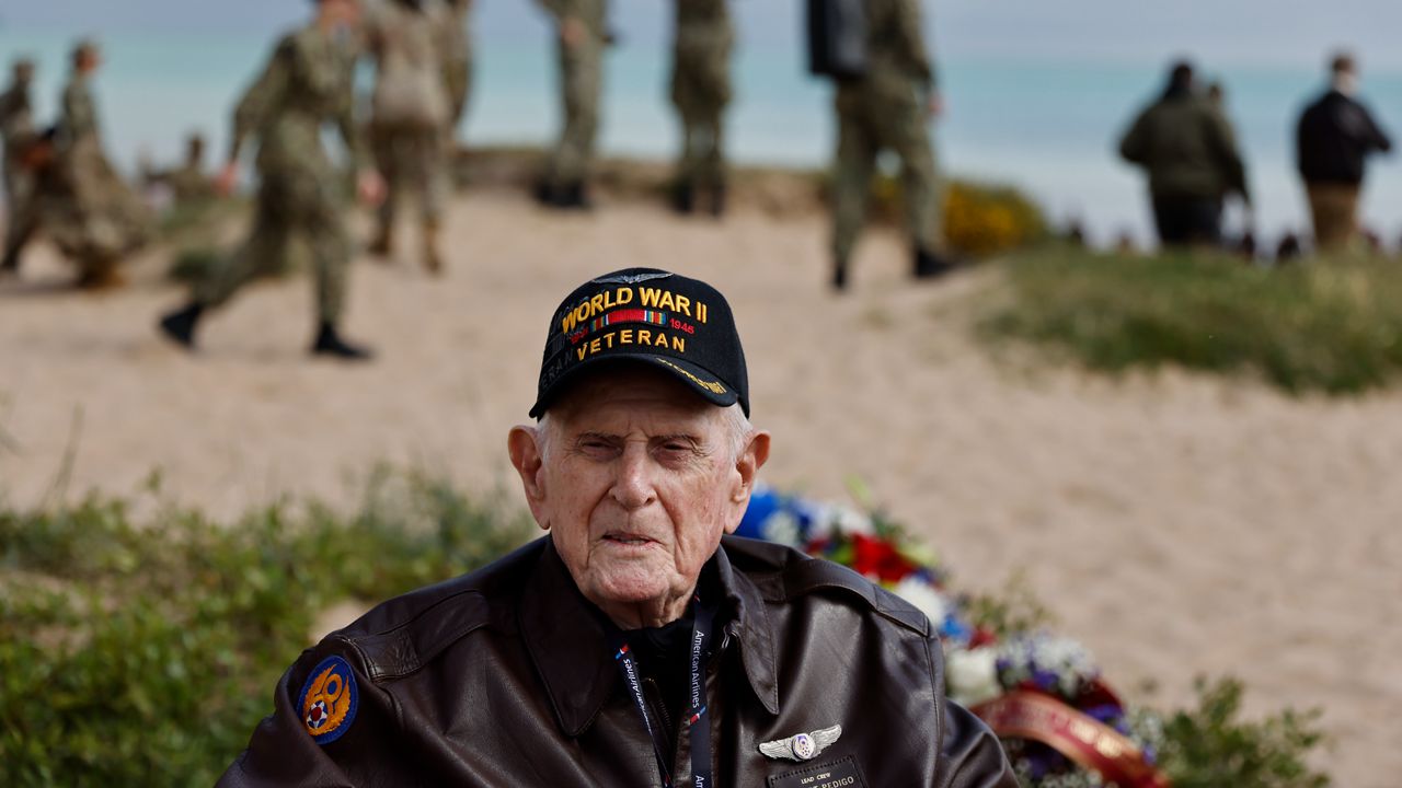 D-Day veteran Bob Pedigo attends a ceremony on Omaha Beach, Tuesday, June 4, 2024 in Normandy. World War II veterans from across the United States as well as Britain and Canada are in Normandy this week to mark 80 years since the D-Day landings that helped lead to Hitler's defeat. (AP Photo/Jeremias Gonzalez)