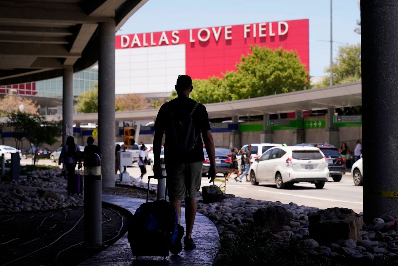 Police Woman who opened fire at Dallas airport shot at cop