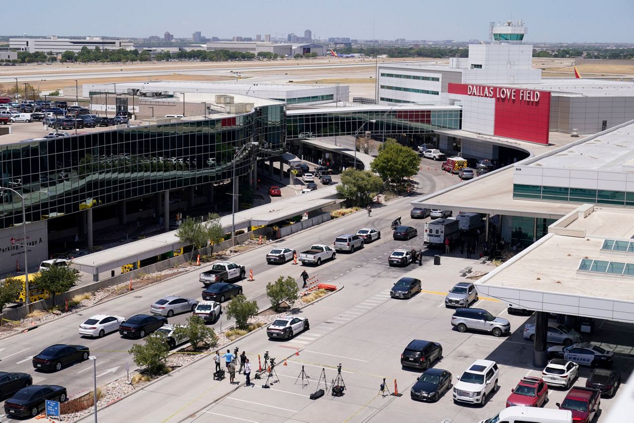 Police Woman who opened fire at Dallas airport shot at cop