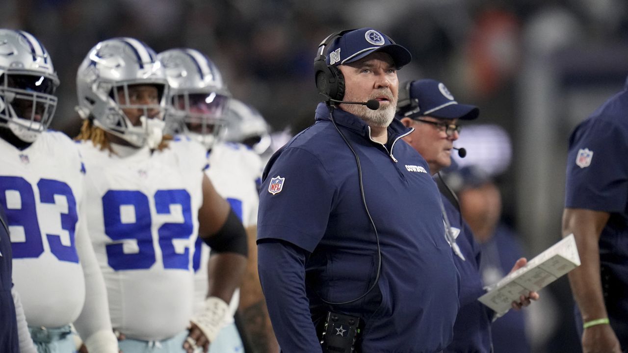 Dallas Cowboys head coach Mike McCarthy watches play against the Tampa Bay Buccaneers in the first half of an NFL football game in Arlington, Texas, Sunday, Dec. 22, 2024. (AP Photo/Julio Cortez)