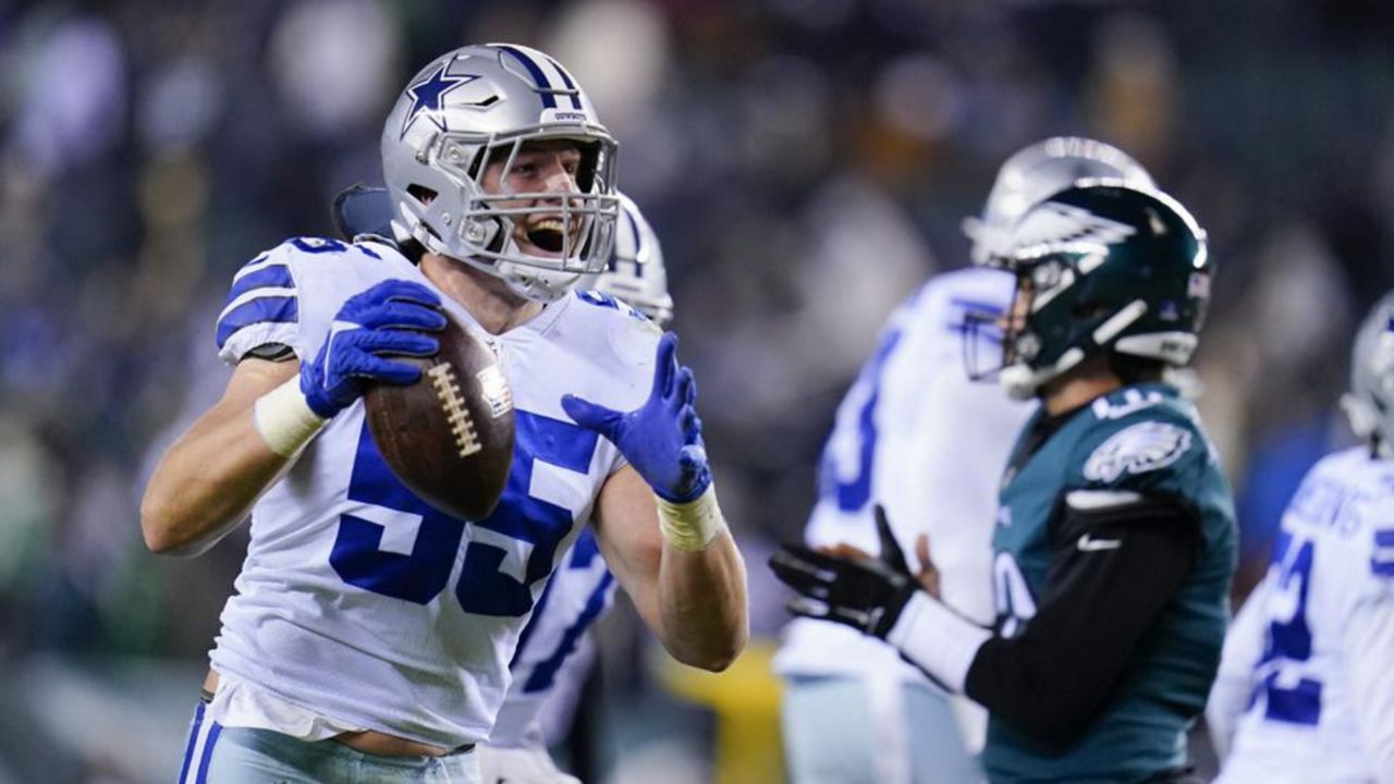 Dallas Cowboys outside linebacker Leighton Vander Esch reacts after making an interception during the second half of an NFL football game against the Philadelphia Eagles, Saturday, Jan. 8, 2022, in Philadelphia. (AP Photo/Julio Cortez)