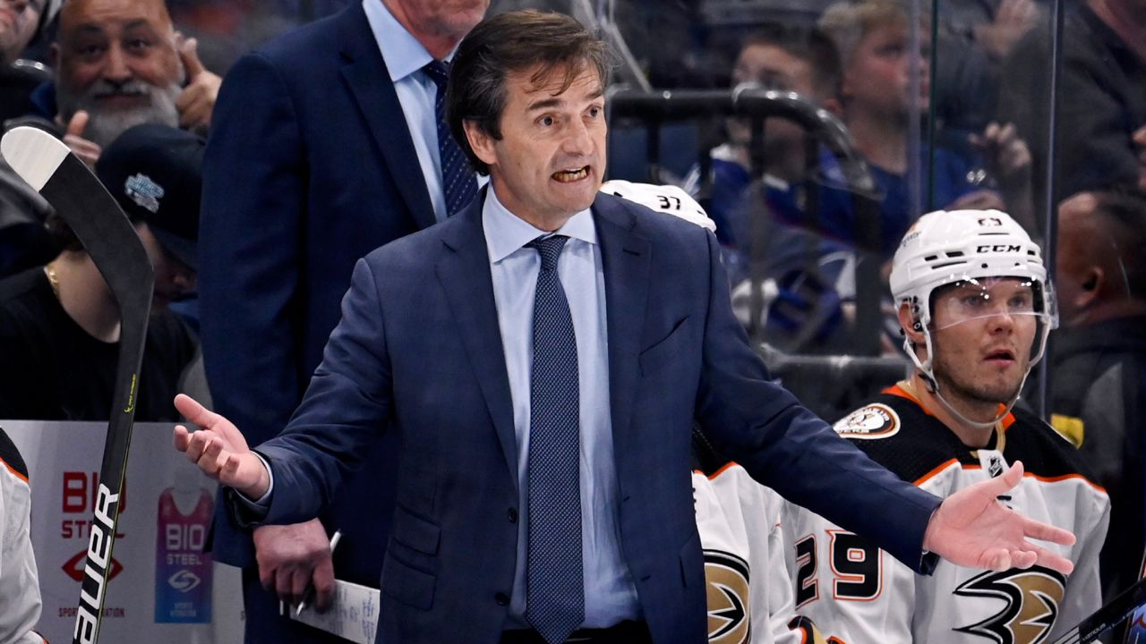 Anaheim Ducks coach Dallas Eakins react to a call during the third period of the team's NHL hockey game against the Tampa Bay Lightning, Tuesday, Feb. 21, 2023, in Tampa, Fla. (AP Photo/Jason Behnken, File)