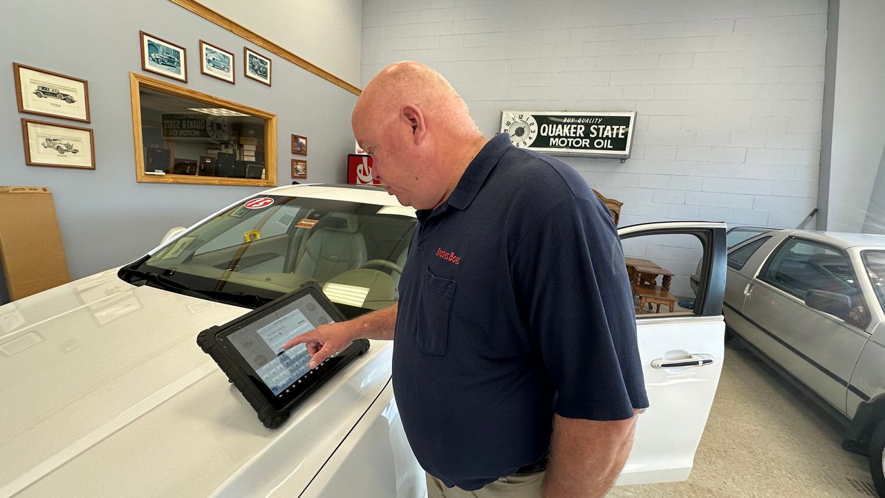 Dan Brooks, owner of Capitol Car Care in Augusta, supports Question 4 because he believes his repair shop and others need more information from auto manufacturers. (Spectrum News/Susan Cover)