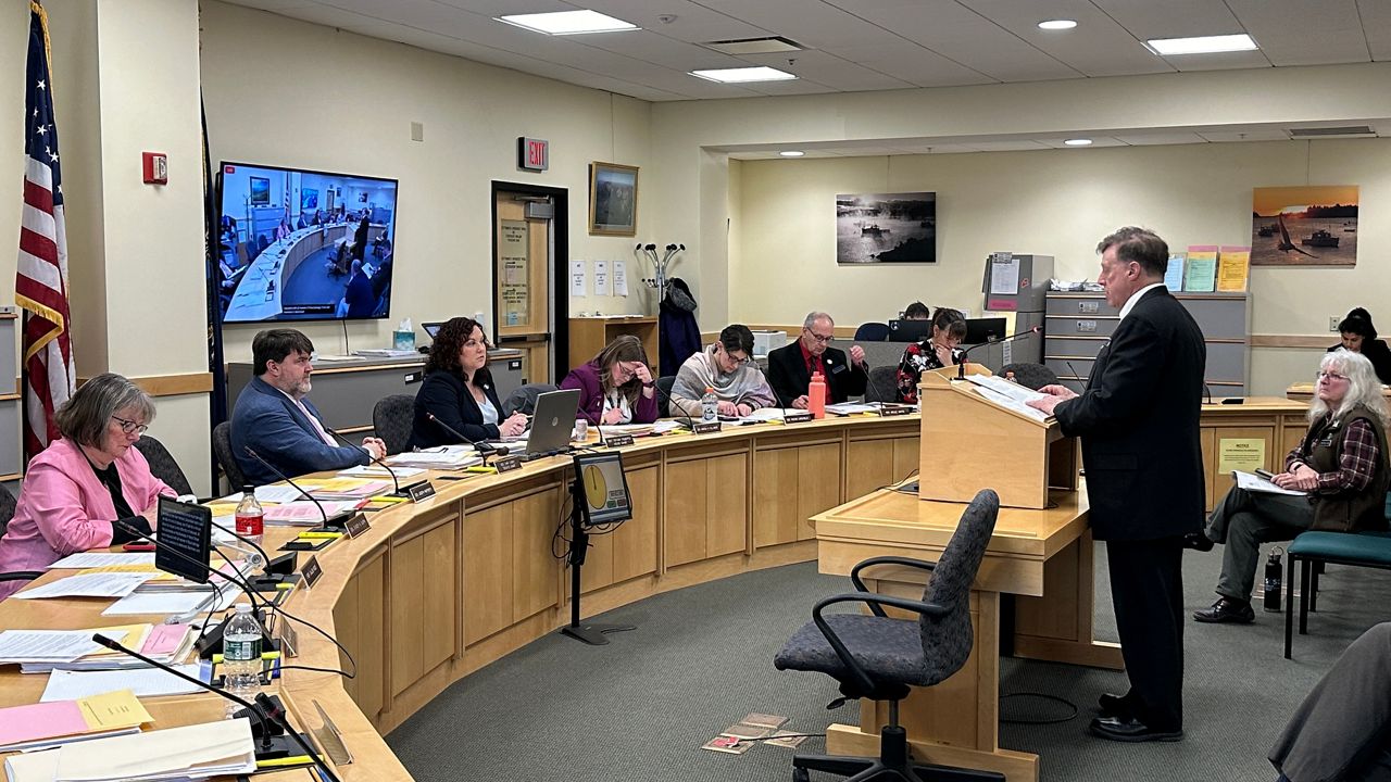 Rep. Dan Shagoury (D-Hallowell) talks about the damage caused by recent storms to businesses in his city Tuesday during a public hearing. (Spectrum News/Susan Cover)