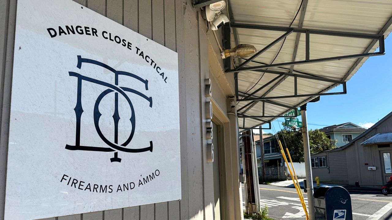 The storefront for Danger Close Tactical, a federally licensed firearms dealer, is seen in a Honolulu neighborhood Thursday, Nov. 21, 2024. (AP Photo/Jennifer Sinco Kelleher)