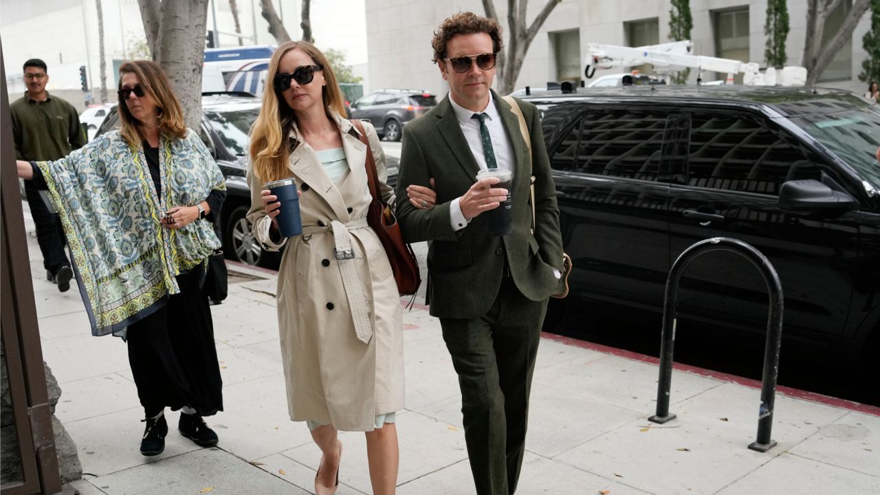 Danny Masterson and his wife Bijou Phillips arrive for closing arguments in his second trial, Tuesday, May 16, 2023, in Los Angeles. (AP Photo/Chris Pizzello)