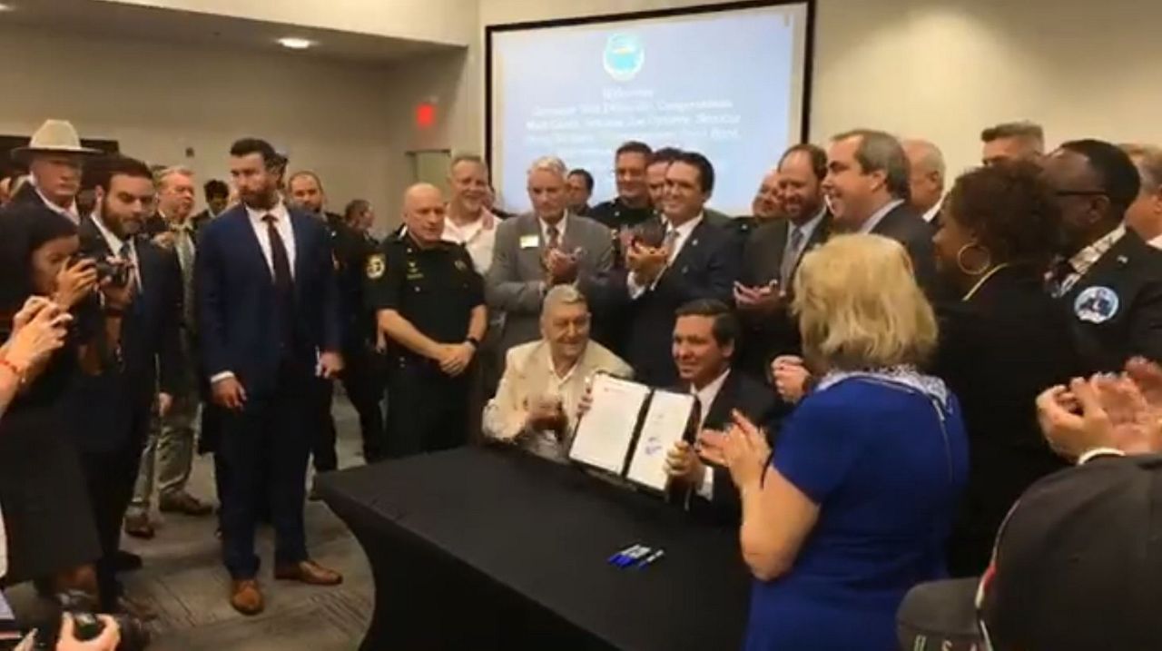 Gov. Ron DeSantis signed a bill into law that would require local law enforcement to fully comply with federal immigration agencies when it comes to illegal immigration. (Gov. Ron DeSantis Facebook page) 