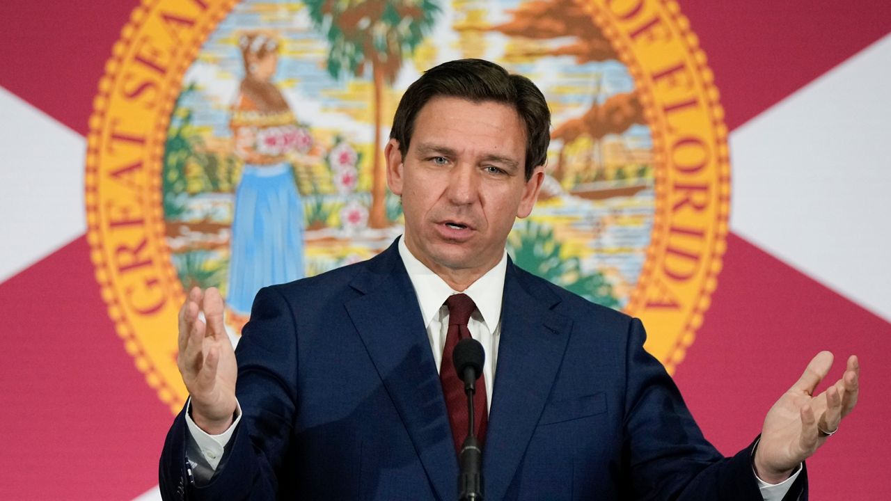 Florida Gov. Ron DeSantis speaks during a news conference to sign several bills related to public education and increases in teacher pay, in Miami, Tuesday, May 9, 2023. (AP Photo/Rebecca Blackwell)