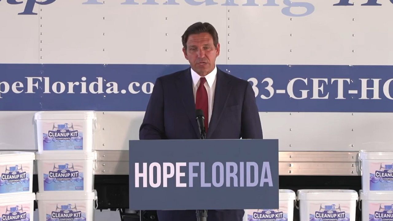 At a news conference in Sarasota on Wednesday, Gov. Ron DeSantis talked about election software glitches, as well as the expansion of a program designed to help Floridians after disasters. (Spectrum News image)