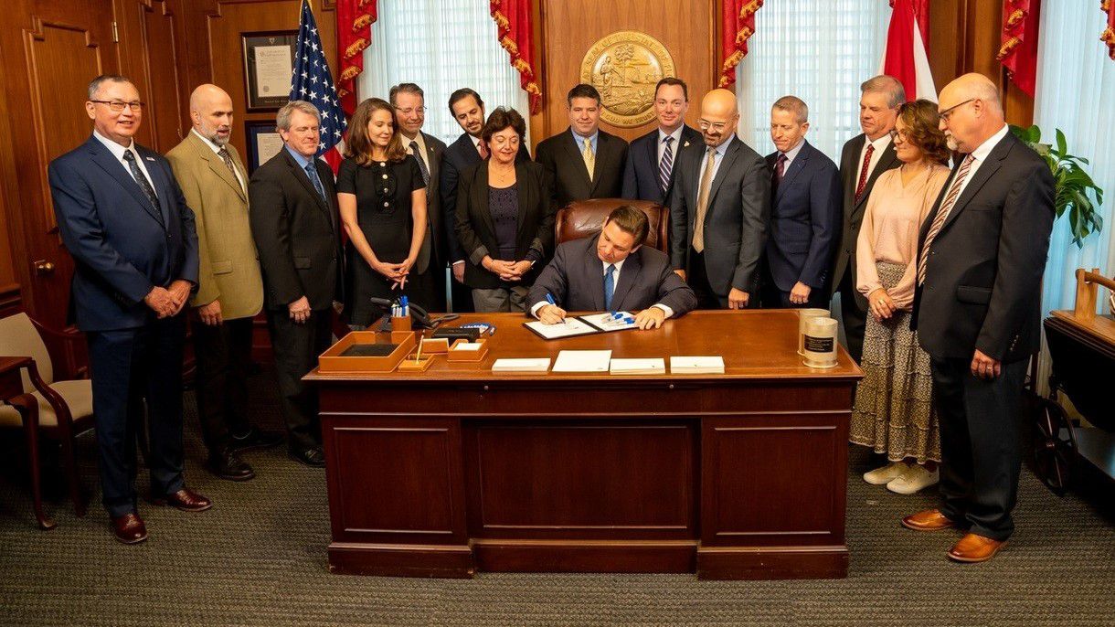 Governor Ron DeSantis signs HB 837 into law. Photo Courtesy of the Executive Office of Governor Ron DeSantis.