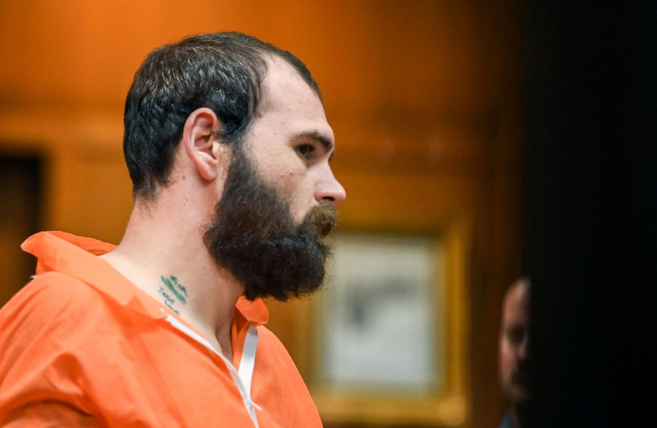 Suspect accused of burning deputy's body after killing him