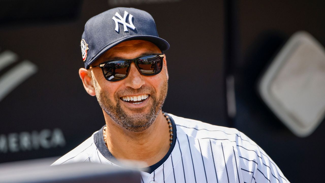 Former New York Yankees' Derek Jeter attends a ceremony at Yankee Stadium before a baseball game between Yankees and Colorado Rockies, Saturday, Aug. 24, 2024, in New York. (AP Photo/Eduardo Munoz Alvarez)