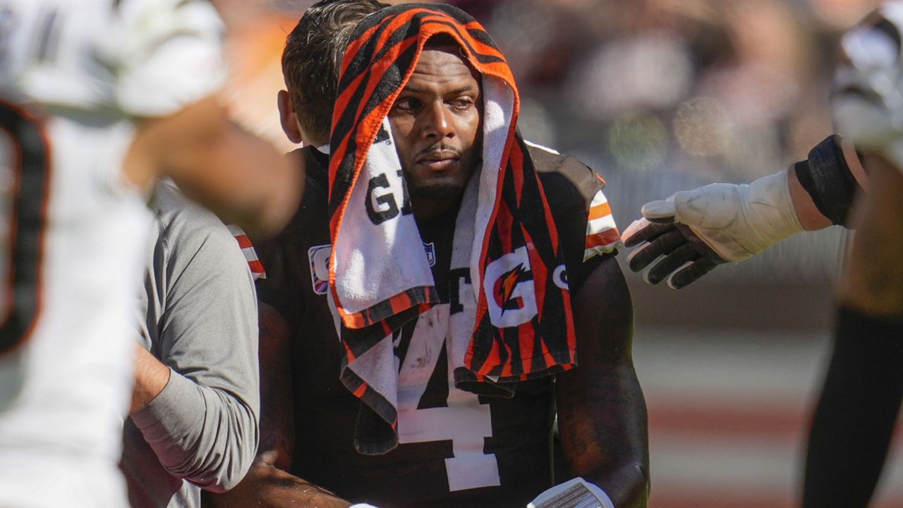 Cleveland Browns quarterback Deshaun Watson (4) is carted off the field after being injured in the first half of an NFL football game against the Cincinnati Bengals, Sunday, Oct. 20, 2024, in Cleveland. (AP Photo/Sue Ogrocki)