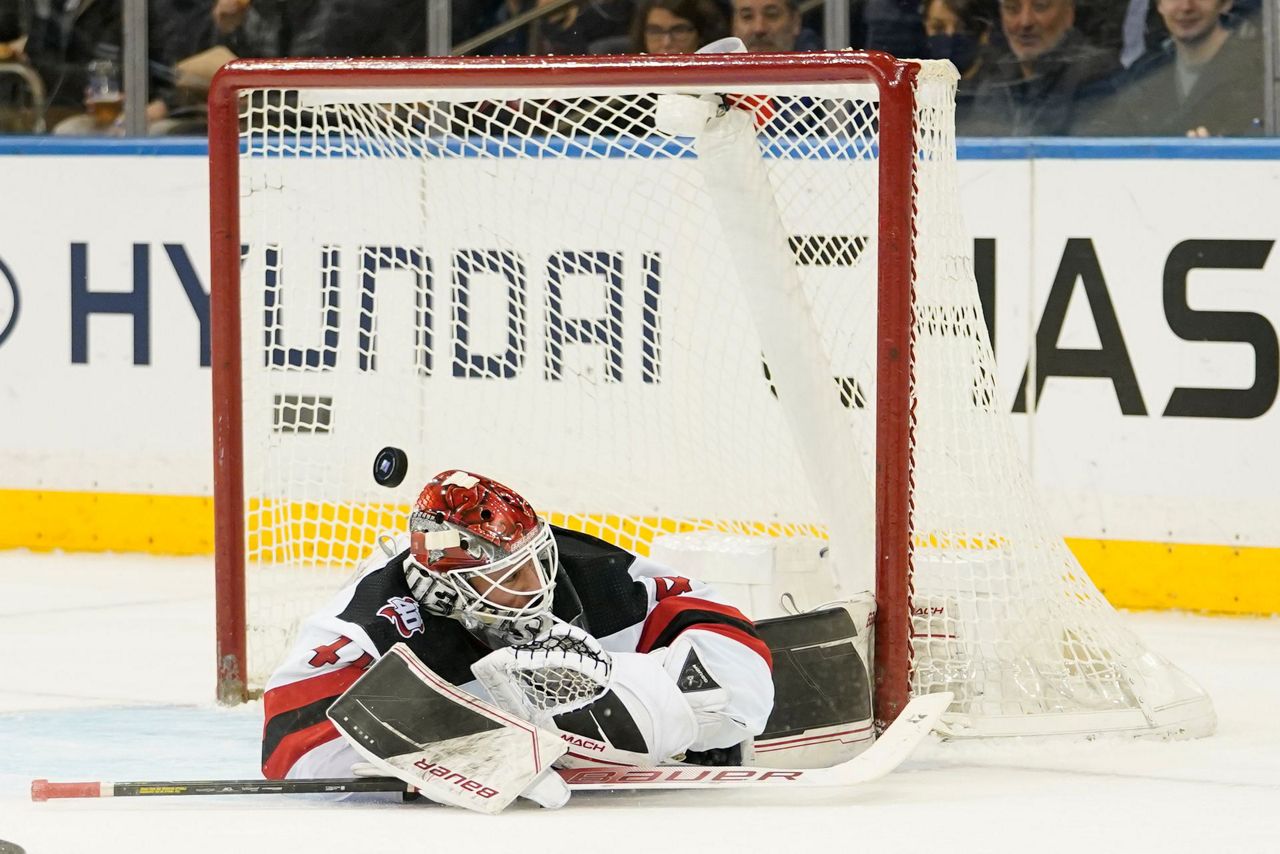 Rangers win 43 in OT to end Devils' 11game road win streak