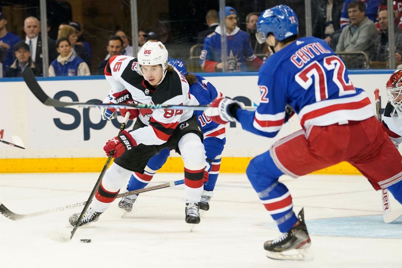 Rangers win 43 in OT to end Devils' 11game road win streak
