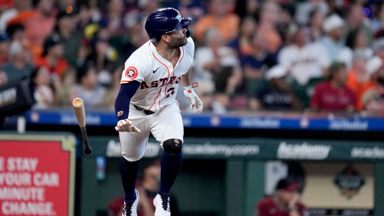 Houston Astros' Jose Altuve watches his solo home run against the Arizona Diamondbacks during the seventh inning of a baseball game Saturday, Sept. 7, 2024, in Houston. (AP Photo/Eric Christian Smith)