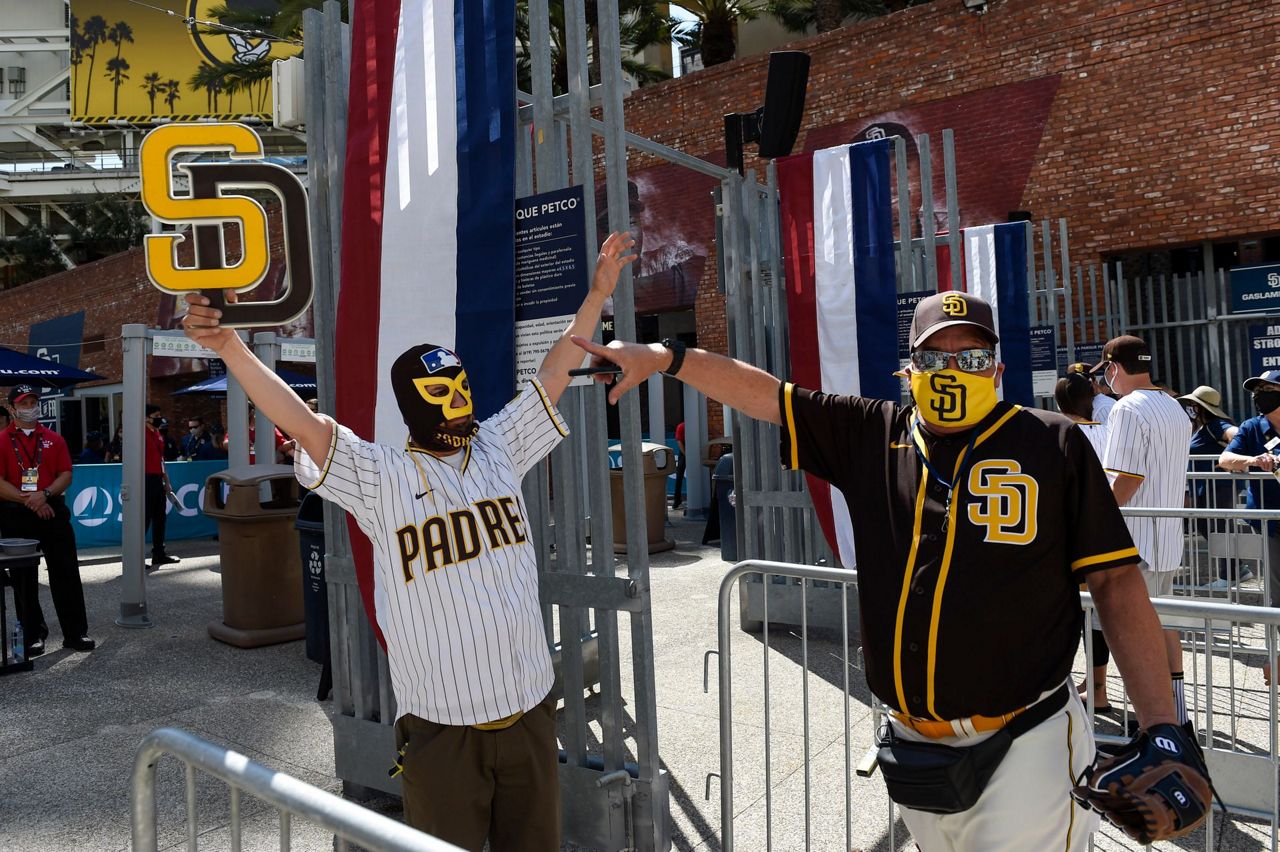 Fans walk the concourse at Comerica Park during a MLB game between